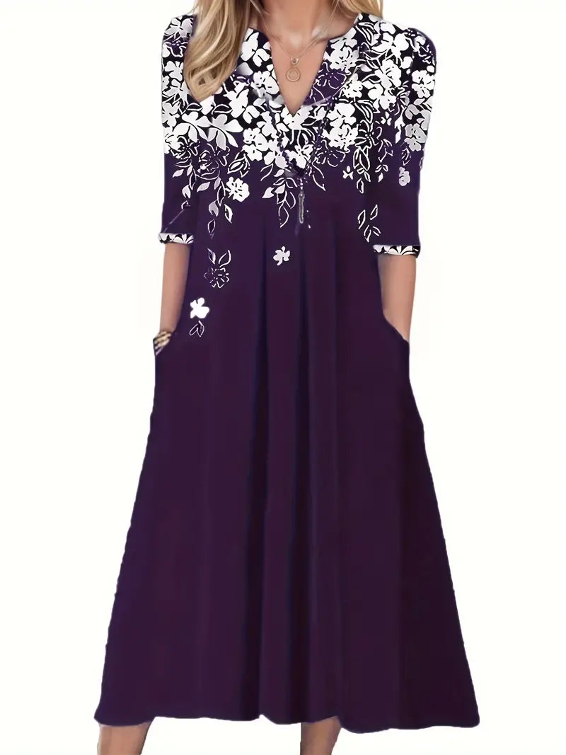 Lässiges Kleid mit V-Ausschnitt und Blumenmuster und halben Ärmeln