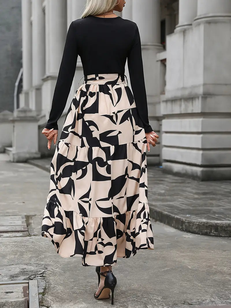 Elegantes gestreiftes Maxikleid mit V-Ausschnitt und langen Ärmeln