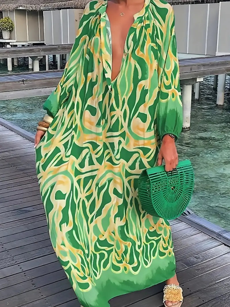 Maxikleid mit abstraktem Druck und Knopfleiste