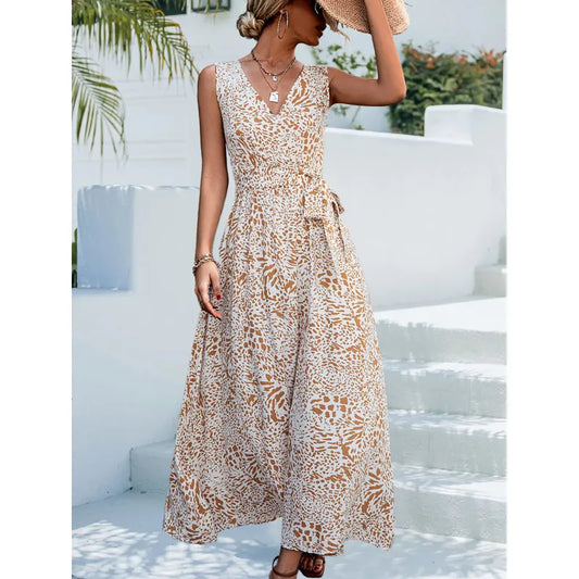 Elegantes, ausgestelltes Kleid mit Blumenmuster und Gürtel