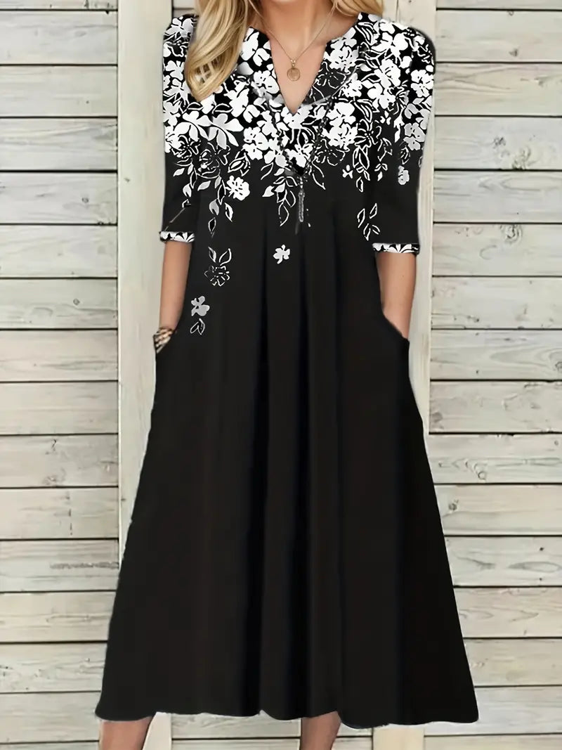 Lässiges Kleid mit V-Ausschnitt und Blumenmuster und halben Ärmeln