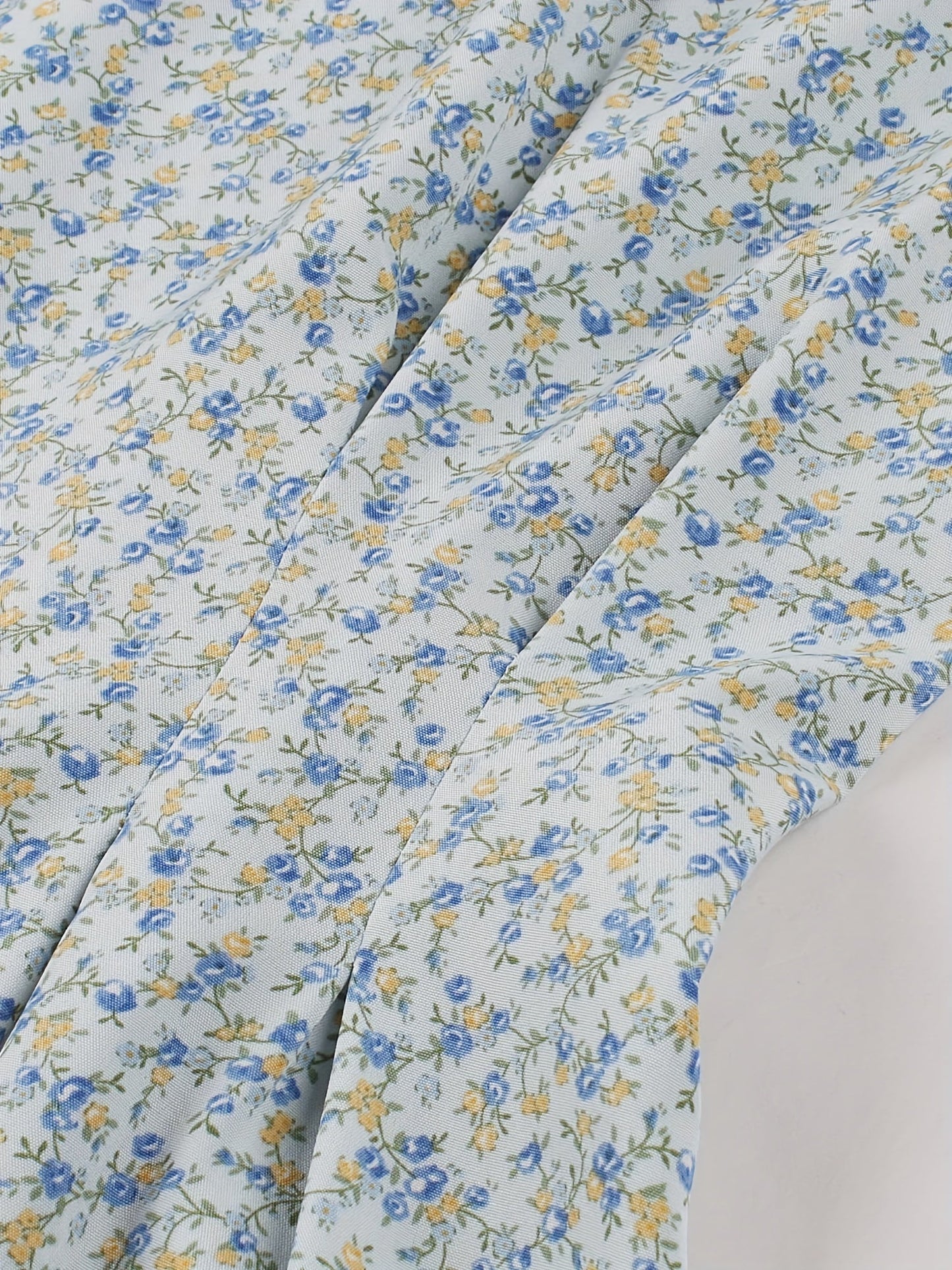 Elegantes Sommerkleid – Ärmelloses A-Linien-Midikleid mit Blumenmuster